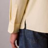 Camisa de popelín lavado con botones y corte holgado