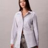 Camisa holgada de popelín a rayas con botones Camisa holgada de popelín a rayas con botones