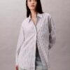 Camisa holgada de popelín a rayas con botones Camisa holgada de popelín a rayas con botones