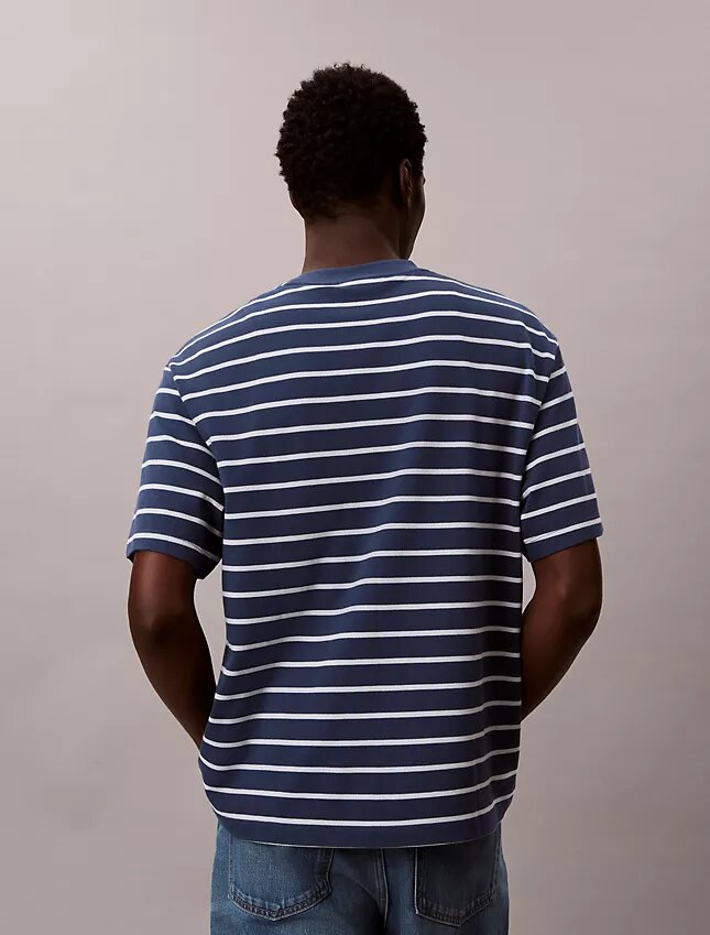 Camiseta holgada con gráfico de logotipo a rayas Camiseta holgada con gráfico de logotipo a rayas