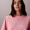 Camiseta holgada con gráfico del logotipo del arco