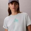 Camiseta holgada con gráfico floral del logotipo Camiseta holgada con gráfico floral del logotipo