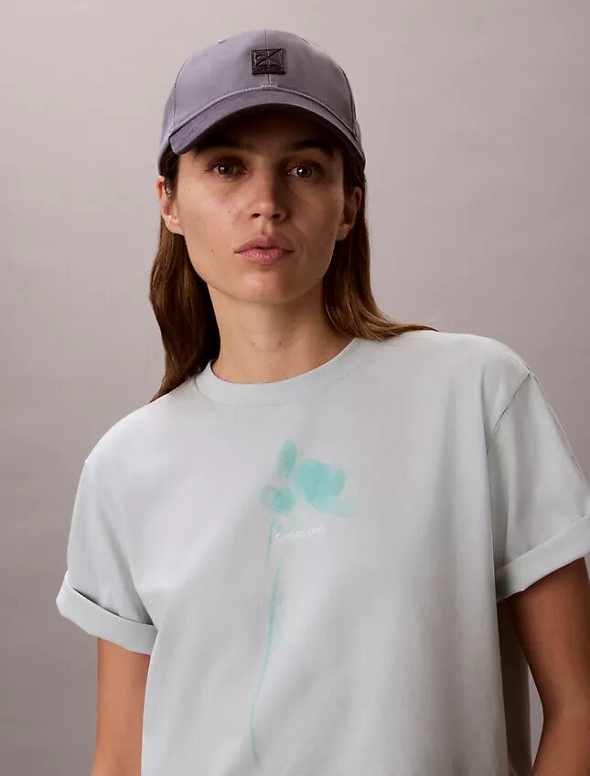 Camiseta holgada con gráfico floral del logotipo Camiseta holgada con gráfico floral del logotipo