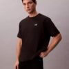 Camiseta holgada con logo gráfico de piqué refrescante Camiseta holgada con logo gráfico de piqué refrescante