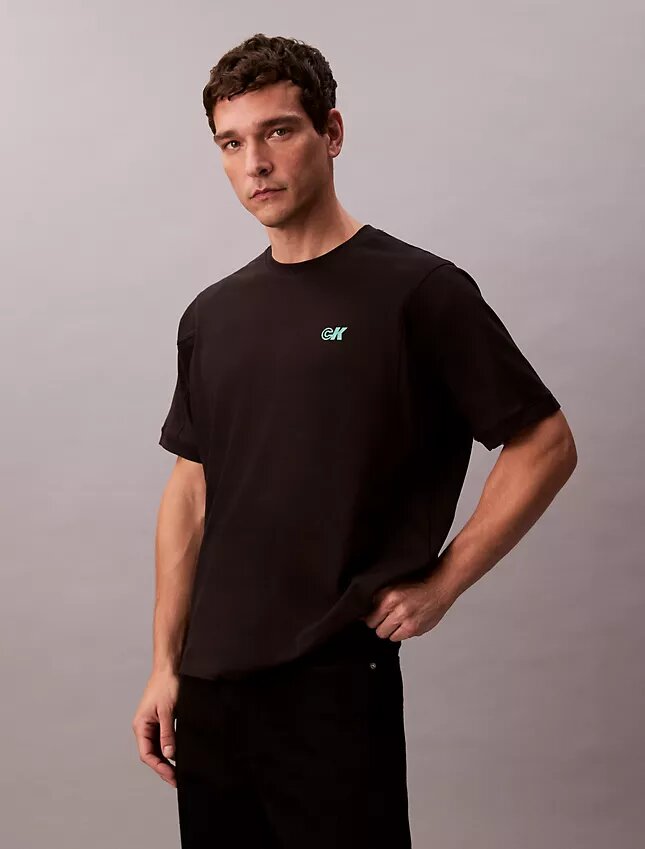 Camiseta holgada con logo gráfico de piqué refrescante Camiseta holgada con logo gráfico de piqué refrescante