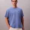 Camiseta holgada con logo gráfico de piqué refrescante Camiseta holgada con logo gráfico de piqué refrescante