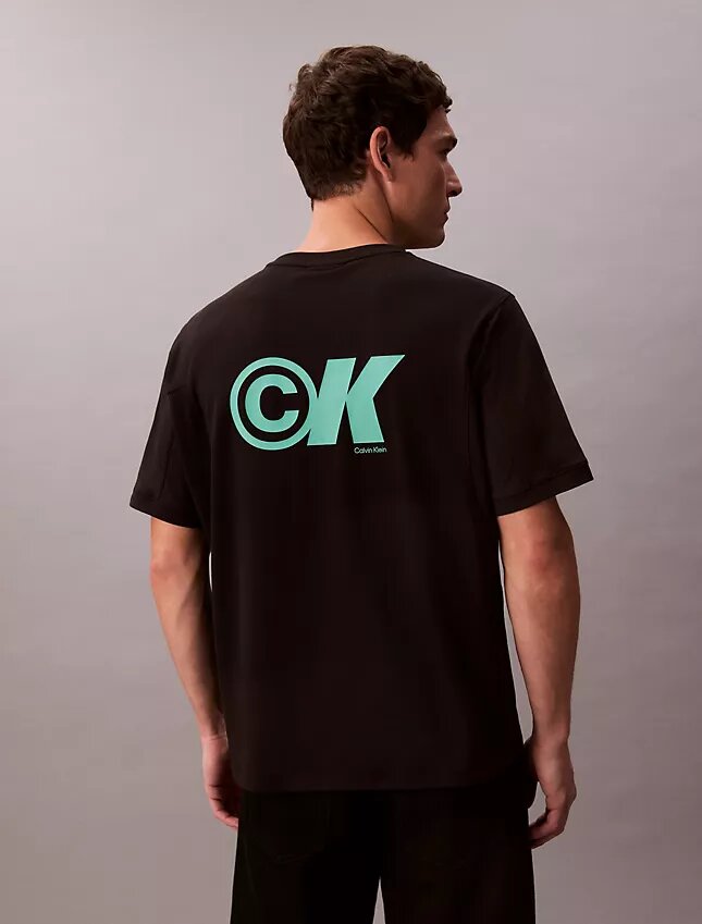 Camiseta holgada con logo gráfico de piqué refrescante Camiseta holgada con logo gráfico de piqué refrescante