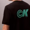 Camiseta holgada con logo gráfico de piqué refrescante Camiseta holgada con logo gráfico de piqué refrescante