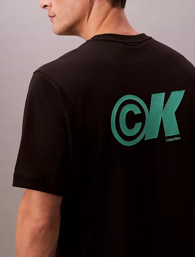 Camiseta holgada con logo gráfico de piqué refrescante Camiseta holgada con logo gráfico de piqué refrescante