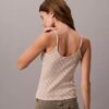 Camiseta sin mangas con monograma integral y canalé contorneado Camiseta sin mangas con monograma integral y canalé contorneado