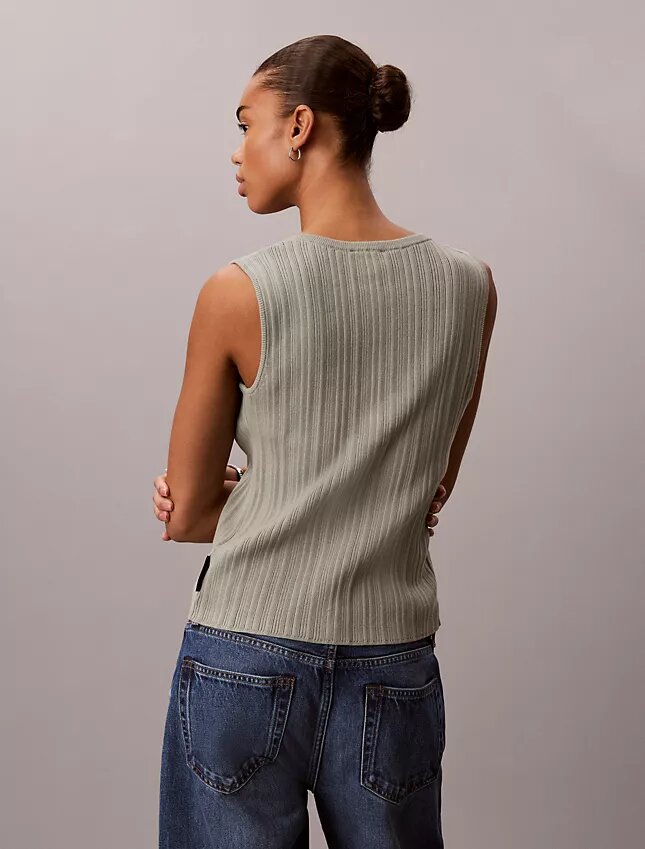 Camiseta sin mangas de algodón liso con botones y canalé Camiseta sin mangas de algodón liso con botones y canalé