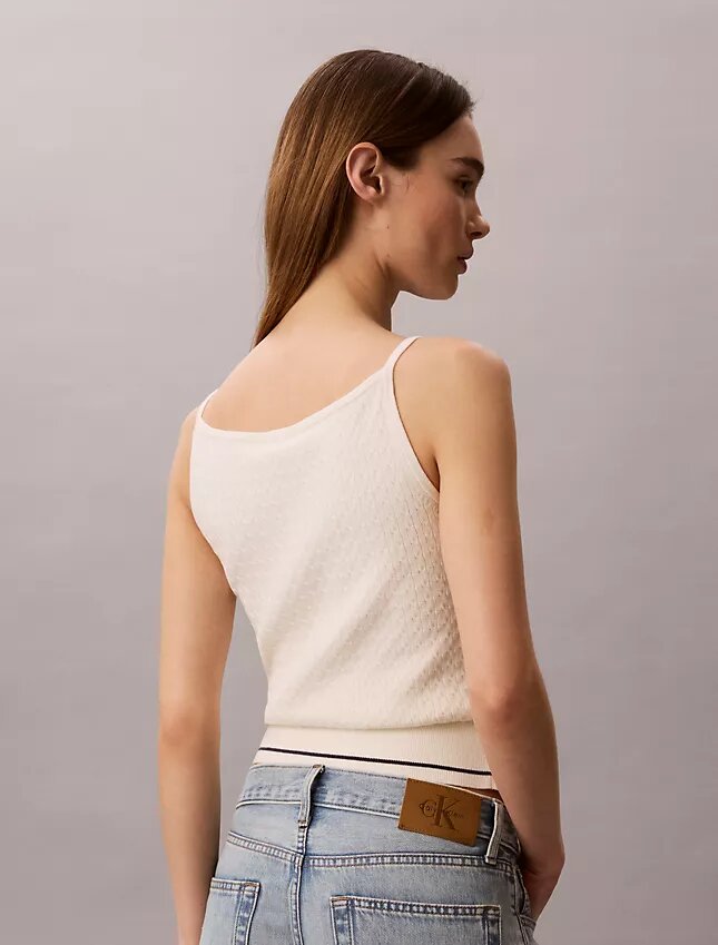 Camiseta sin mangas de punto trenzado con Monologo tejido Camiseta sin mangas de punto trenzado con Monologo tejido