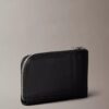 Cartera con cremallera y monogram en relieve en toda la superficie Cartera con cremallera y monogram en relieve en toda la superficie