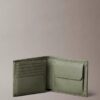 Cartera de tres pliegues de cuero con textura de guijarros y bolsillo para monedas Cartera de tres pliegues de cuero con textura de guijarros y bolsillo para monedas