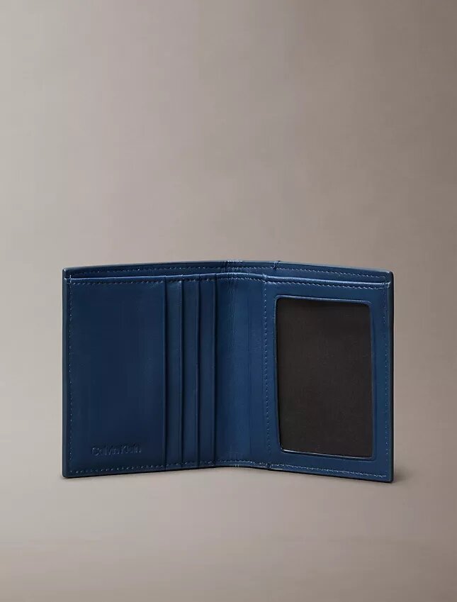 Cartera doble con emblema Cartera doble con emblema