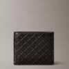 Cartera doble con Monogram en relieve en toda la superficie y bolsillo para monedas