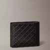 Cartera doble con Monogram en relieve en toda la superficie y bolsillo para monedas