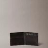Cartera doble con Monogram en relieve en toda la superficie y bolsillo para monedas