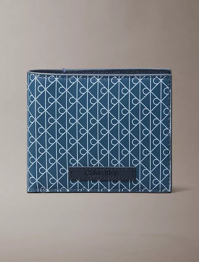 Cartera plegable con el logotipo del emblema en toda la superficie y bolsillo para monedas Cartera plegable con el logotipo del emblema en toda la superficie y bolsillo para monedas