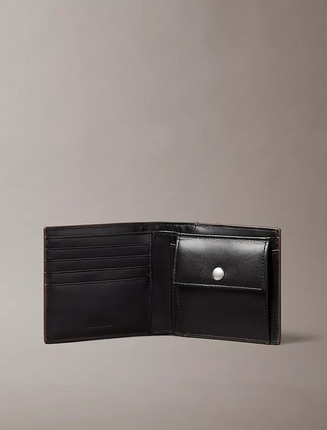 Cartera plegable con el logotipo del emblema en toda la superficie y bolsillo para monedas Cartera plegable con el logotipo del emblema en toda la superficie y bolsillo para monedas