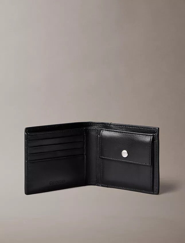 Cartera plegable con el logotipo del emblema en toda la superficie y bolsillo para monedas Cartera plegable con el logotipo del emblema en toda la superficie y bolsillo para monedas