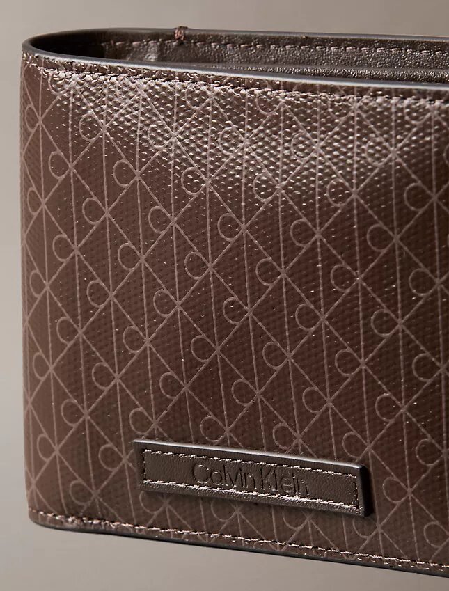 Cartera plegable con el logotipo del emblema en toda la superficie y bolsillo para monedas Cartera plegable con el logotipo del emblema en toda la superficie y bolsillo para monedas