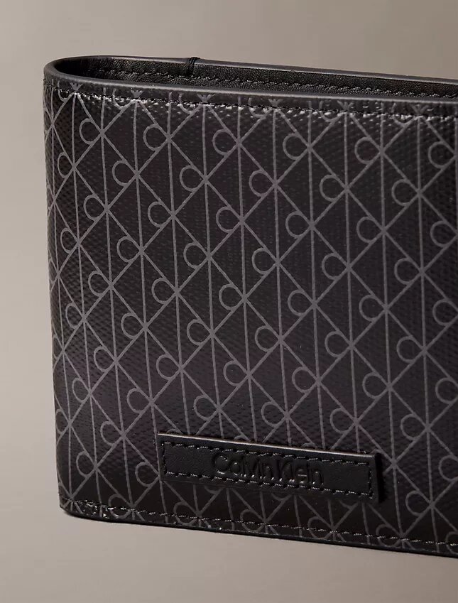 Cartera plegable con el logotipo del emblema en toda la superficie y bolsillo para monedas Cartera plegable con el logotipo del emblema en toda la superficie y bolsillo para monedas