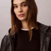 Chaqueta con capucha de piel sintética Chaqueta con capucha de piel sintética