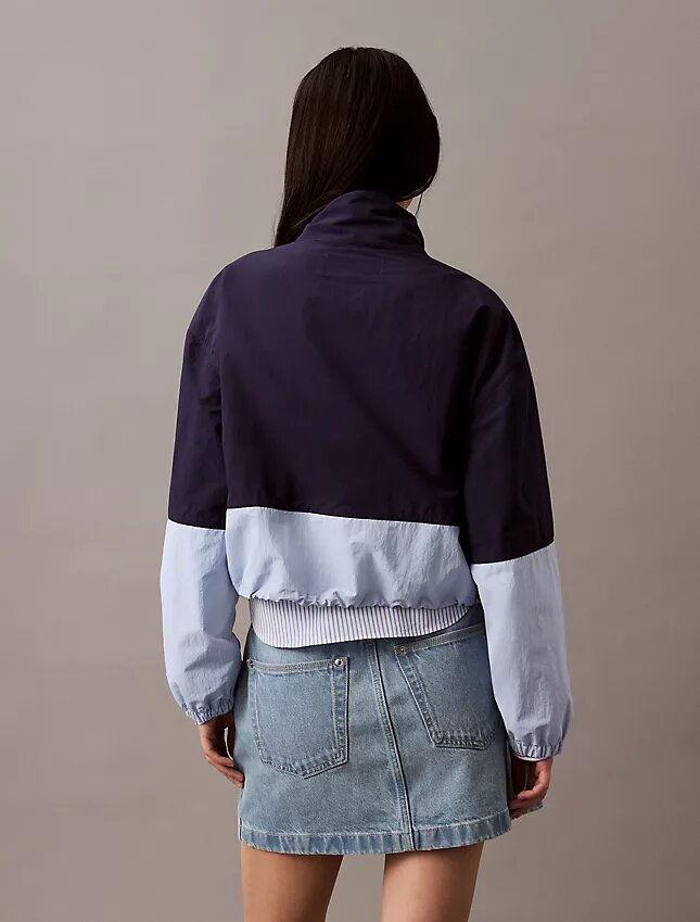 Chaqueta de nylon con cremallera y bloques de color Chaqueta de nylon con cremallera y bloques de color