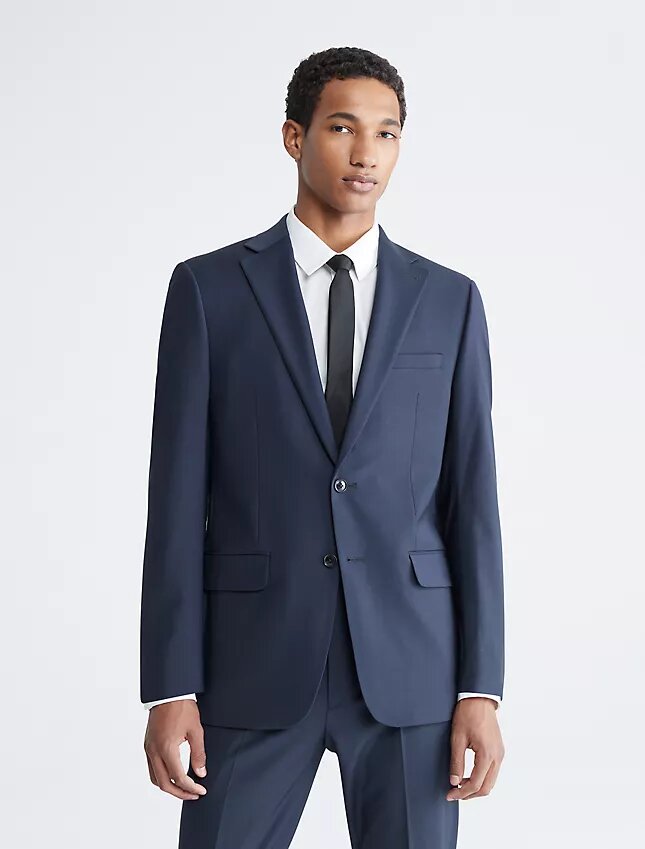 Chaqueta de traje azul marino de corte ajustado Chaqueta de traje azul marino de corte ajustado