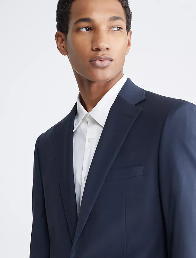 Chaqueta de traje azul marino de corte ajustado Chaqueta de traje azul marino de corte ajustado