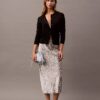 Falda midi estampada de satén arrugado Falda midi estampada de satén arrugado