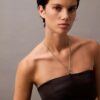 Minivestido con corte halter y aberturas