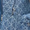 Mochila de Denim con logotipo en todo el diseño Mochila de Denim con logotipo en todo el diseño