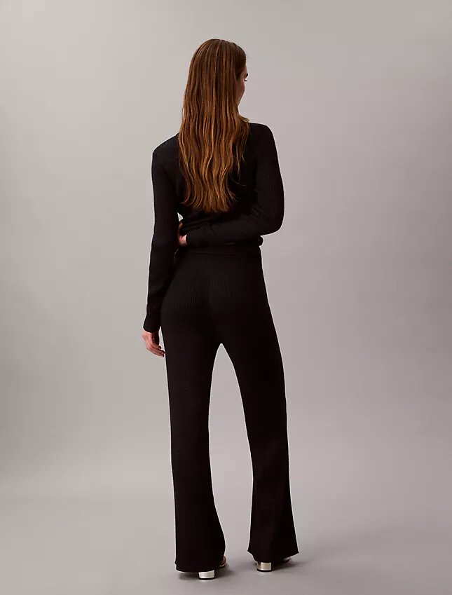 Pantalones acampanados de mezcla de lana merino y lurex Pantalones acampanados de mezcla de lana merino y lurex