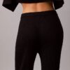 Pantalones acampanados de mezcla de lana merino y lurex Pantalones acampanados de mezcla de lana merino y lurex