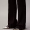 Pantalones acampanados de mezcla de lana merino y lurex Pantalones acampanados de mezcla de lana merino y lurex