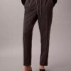 Pantalones ajustados a la tobillera con rayas y cordón Pantalones ajustados a la tobillera con rayas y cordón