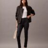Pantalones ajustados con estampado de espiga en tejido Ponte Pantalones ajustados con estampado de espiga en tejido Ponte