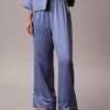 Pantalones con brillo satinado Pantalones con brillo satinado
