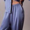 Pantalones con brillo satinado Pantalones con brillo satinado