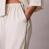 Pantalones con brillo satinado Pantalones con brillo satinado