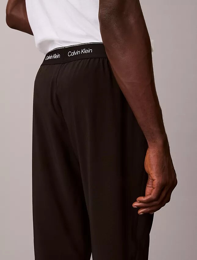 Pantalones con cintura tejida y logotipo deportivo moderno Pantalones con cintura tejida y logotipo deportivo moderno