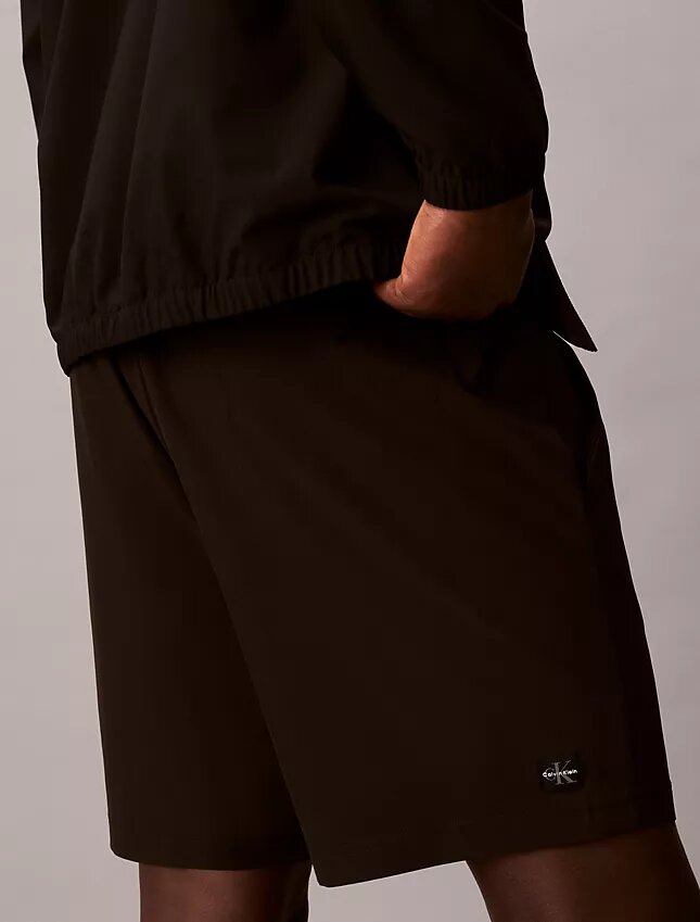 Pantalones cortos con monograma tejido Pantalones cortos con monograma tejido