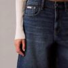 Pantalones cortos de Denim con corte en A y dobladillo enrollado Pantalones cortos de Denim con corte en A y dobladillo enrollado