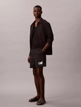 Pantalones cortos sin cordón con gráfico de Monogram
