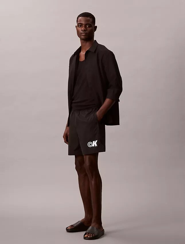 Pantalones cortos sin cordón con gráfico de Monogram Pantalones cortos sin cordón con gráfico de Monogram