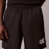 Pantalones cortos sin cordón con gráfico de Monogram Pantalones cortos sin cordón con gráfico de Monogram