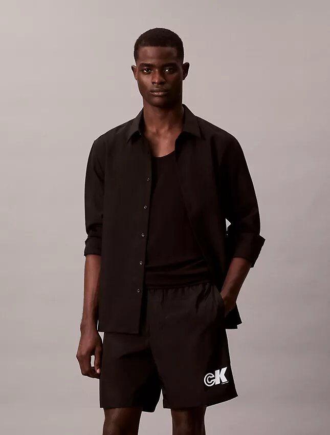 Pantalones cortos sin cordón con gráfico de Monogram Pantalones cortos sin cordón con gráfico de Monogram