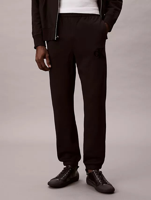 Pantalones de chándal con parche de monograma de felpa Pantalones de chándal con parche de monograma de felpa